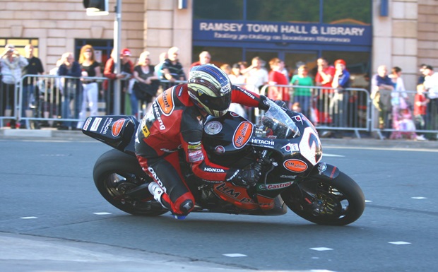 John McGuinness roars through Ramsey during Monday's practice session (Mark Walters)